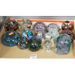 A collection of assorted glass paperweights, to include Langham etc