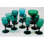 A small collection of 19th century and later green glassware, to include conical examples (10)