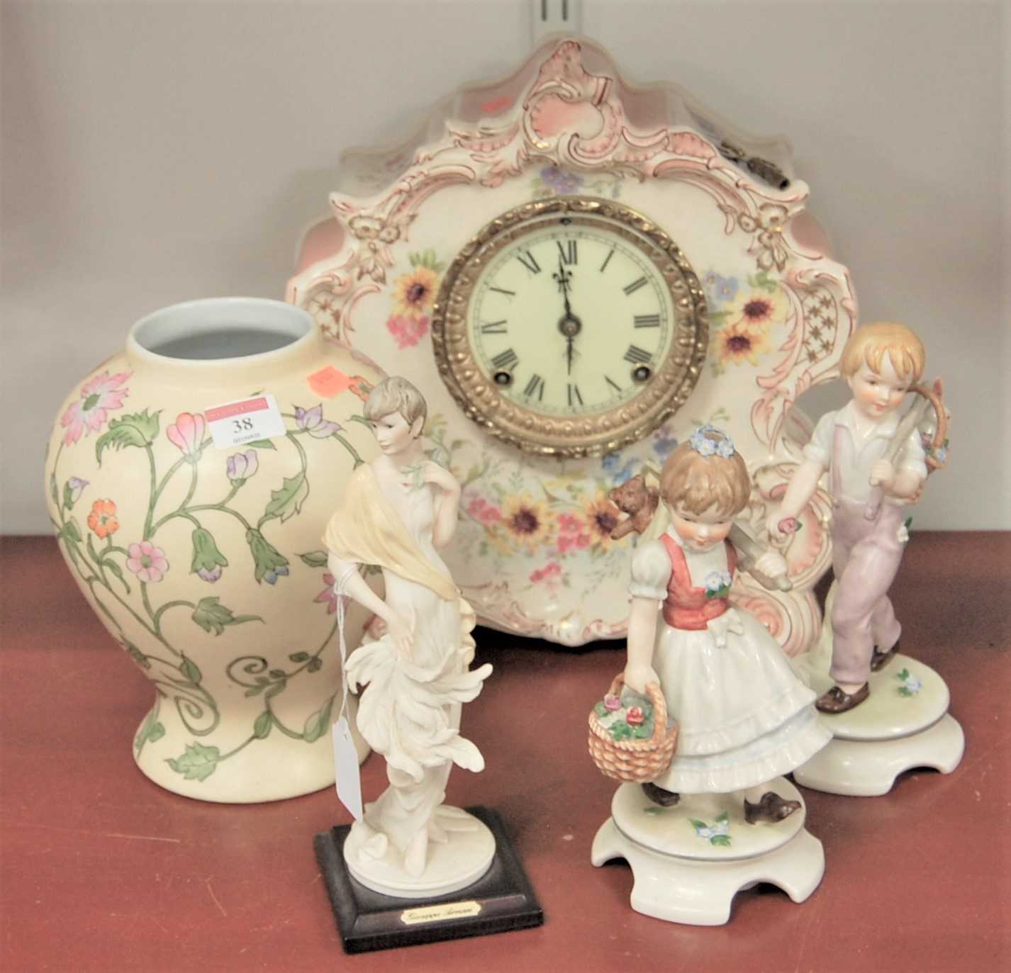 Mixed ceramics to include mantel clock, two Hummel figures, baluster vase and resin figure (5)