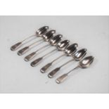 Seven various 19th century silver teaspoons, in the Fiddle pattern, each with monogrammed terminals,