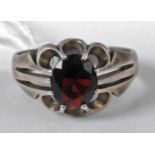 A gent's silver and red hardstone set ring, size W