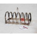 A mid-20th century silver six division toast rack by Viners, 2.2oz