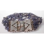 A contemporary white metal (stamped 925) and beaded glass bracelet, bracelet w.26mm