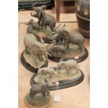 A collection of five Country Artists resin figures of elephants to include elephant cow and calves