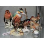 A collection of assorted bird and animal figures, to include Royal Crown Derby Kingfisher, Goebel