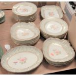 A Victorian part dessert service, each painted with flowers within gilt borders