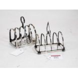 A late Victorian silver four division toast rack, having heart shaped handle, raised on squat ball