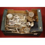 A box of miscellaneous metalware, to include a Victorian silver plated coffee pot, having repousee