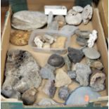A box containing assorted geodes, rock crystal specimens, early pottery artefacts etc