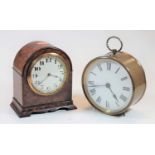 A lacquered brass cased drum clock having unsigned white enamel dial, dia. 13.5cm, together with a