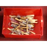 A box of miscellaneous loose silver plated flatware, mainly being fish cutlery