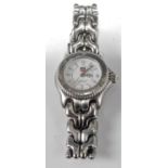 A lady's Tag Heuer steel quartz wristwatch, having white enamel dial signed Professional 200m, and