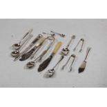 A small collection of mainly 20th century loose silver flatwares to include mustard spoons,