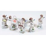 A set of five Naples porcelain figures of cherub musicians, h.12cm; together with a 20th century