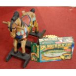 A modern 20th century hand-painted wooden childrens rocking horse; together with a boxed Big Mouth