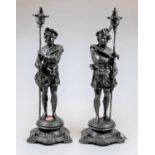 A pair of reproduction bronzed metal figures, 42cm