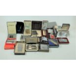 A collection of assorted pocket cigarette lighters to include Ronson Art Deco snakeskin example