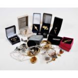 A box of assorted costume jewellery, to include brooches, necklaces etc