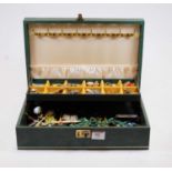 A fitted jewellery box and contents of assorted costume, principally being brooches and ear clips