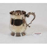 A modern silver tankard, of bell shape, with flying C-scroll handle, on circular footrim,