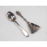 A Dutch white metal caddy spoon; together with a circa 1830 silver teaspoons in the Fiddle