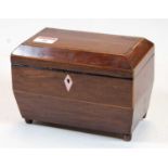 A 19th century partridge wood, ebony and boxwood strung fitted tea caddy of sarcophagus form,