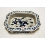 A late 20th century blue and white Chinese ceramic octagonal shallow bowl, decorated with mythical