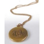 A 9ct gold finelink neck chain; together with a yellow metal monogrammed picture locket