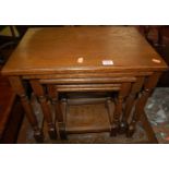 A contemporary oak nest of three occasional tables, the largest w.51cm