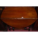 An early 20th century mahogany and beech dropleaf dining table, having gateleg action