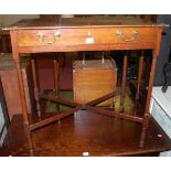 A 19th century mahogany single drawer side table, raised on turned supports united by X-framed