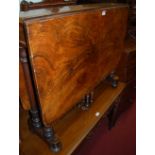 A mid-Victorian figured walnut round cornered Sutherland table, having opposing twin gateleg action,
