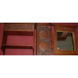 Arts and Crafts relief carved oak occasional furniture to include; rectangular wall mirror, 53 x