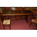 A contemporary oak long trestle end refectory table, length 212cm, together with a set of eight