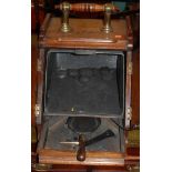 A late Victorian walnut twin door coal purdonium with shovel