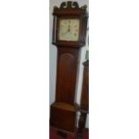 A circa 1800 provincial oak long case clock, having a painted enamel square dial with 30 hour weight