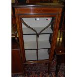 An Edwardian mahogany and boxwood strung single door glazed china display cabinet, w.59cmCondition