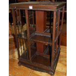 An Edwardian stained mahogany square revolving eight division bookcase, width 48.5cm