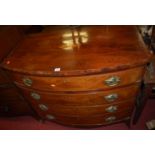 A 19th century Sheraton Revival mahogany crossbanded and satinwood conch-shell inlaid bowfront