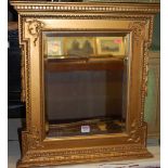 Circa 1900 gilt wood and gesso wall mirror with bevelled plate, 60x54cm