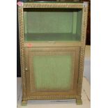 A Lloyd Loom style green painted wicker single drawer bedside cupboard, having open upper