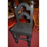 A 17th century style and later painted oak(?) panelled seat single dining chair