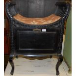 A late Victorian ebonised music stool, having hinged compartment, w.52cm