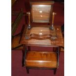 An Edwardian walnut occasional table, having three hinged folding supports, together with a