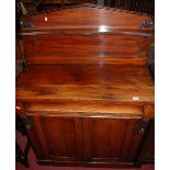 An early Victorian mahogany chiffonier, having raised single shelf superstructure, the cushion