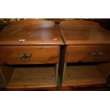 A pair of contemporary pine ledgeback single drawer bedside tables, each with open lower