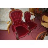 A pair of mid-Victorian mahogany framed ladies and gents spoonback chairs, each button back