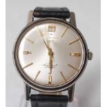A Gents stainless steel Longines Conquest automatic wristwatch, having round silvered baton dial and