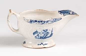 A Lowestoft porcelain moulded cream-boat, underglaze blue painted in the Fisherman & Sampan pattern, - Image 2 of 2