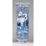 A Chinese export blue and white cylindrical vase, with flared rim, decorated with opposing